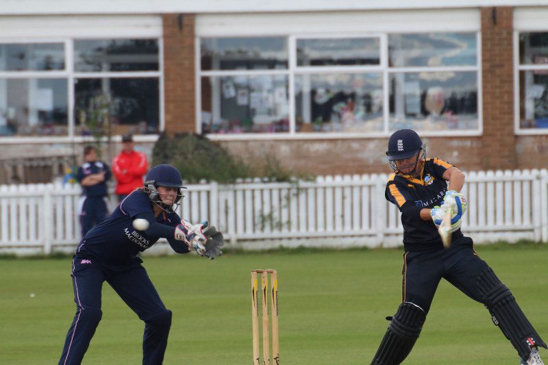 Lauren Winfield cuts the ball for Yorkshire Women at Harrogate Cricket Club