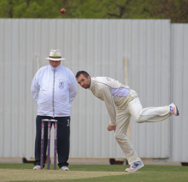 Dan Woods of York Cricket Club bowls
