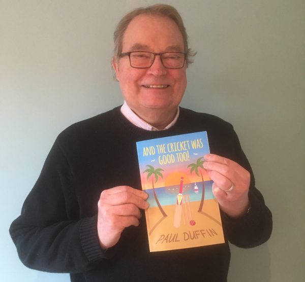author paul duffin holds up his copy of his cricket book - and the cricket was good too!