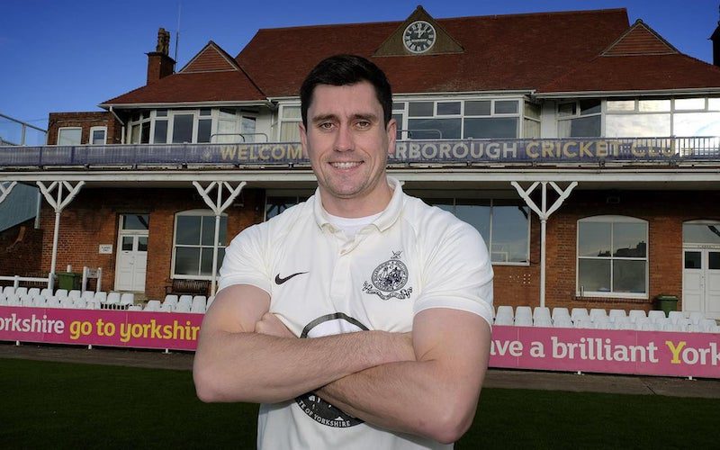 Pat Roberts Scarborough Cricket Club captain poses outside the pavilion